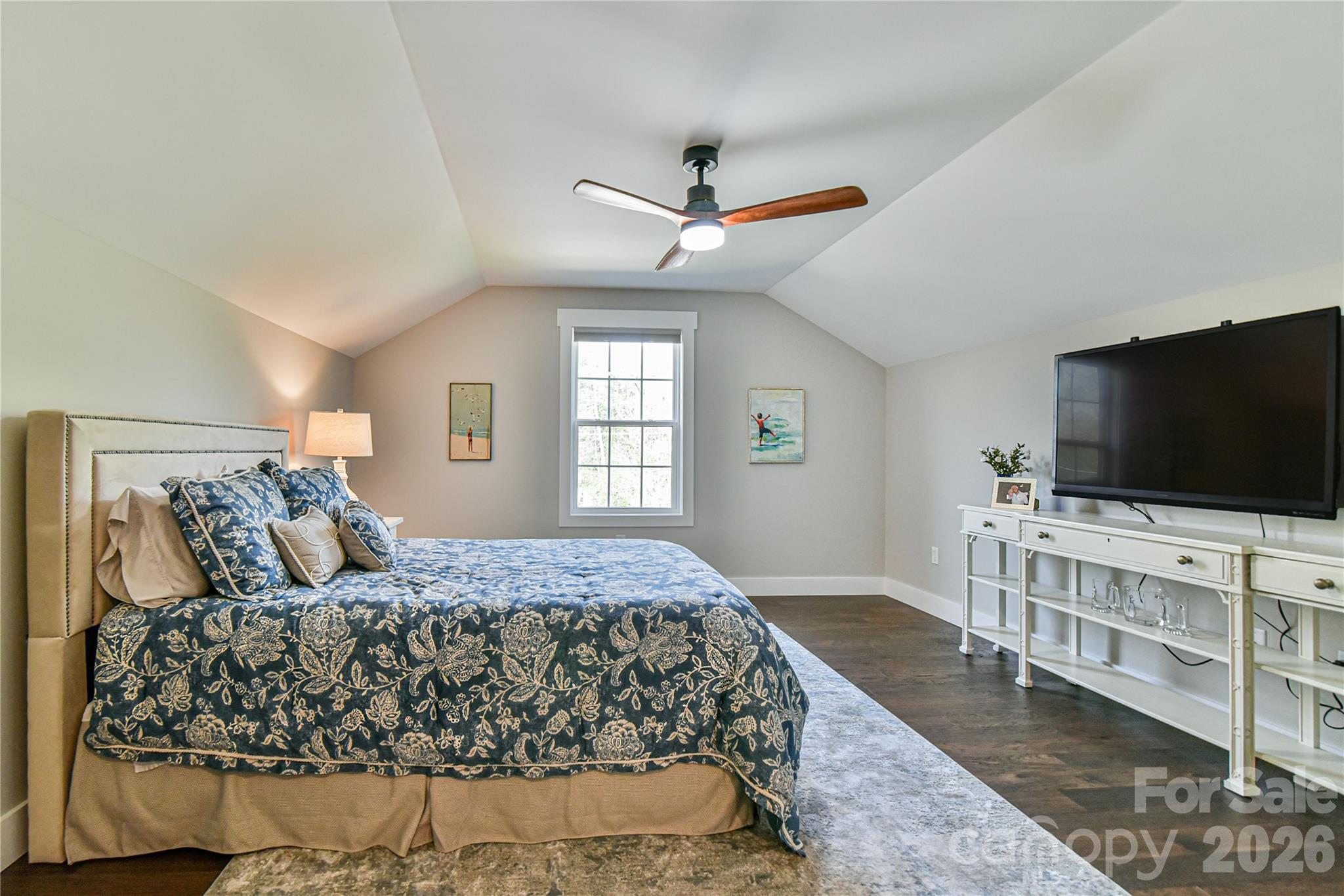 310 Portmanvilla Road Black Mountain, NC 28711 - Photo 27 of 30 a bedroom with a large bed and a flat screen tv