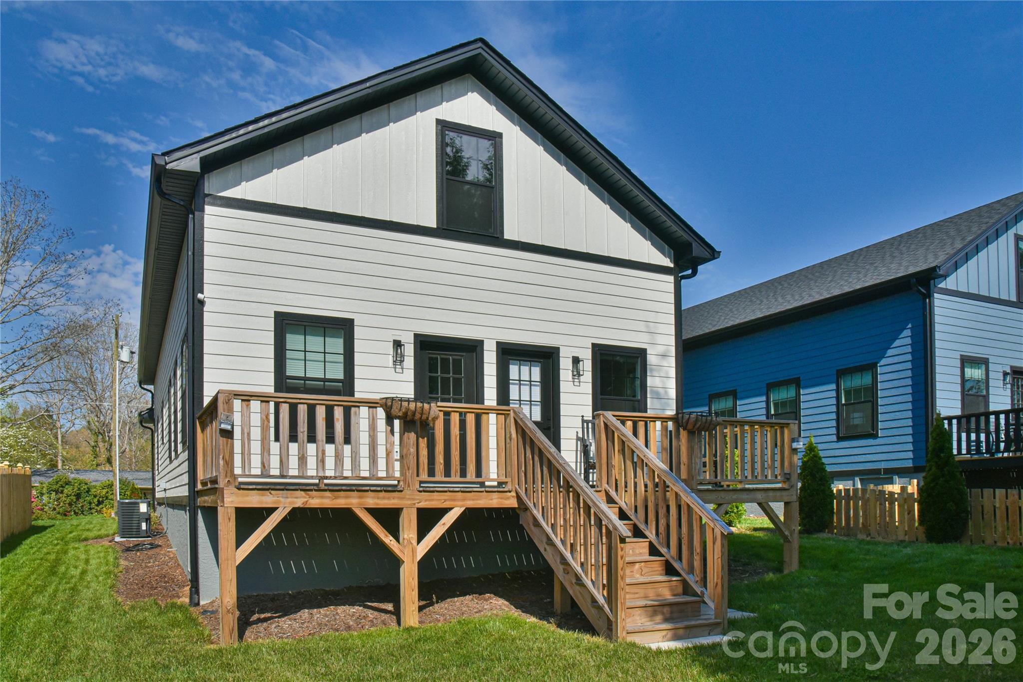 310 Portmanvilla Road Black Mountain, NC 28711 - Photo 5 of 30 a view of house with a yard and deck
