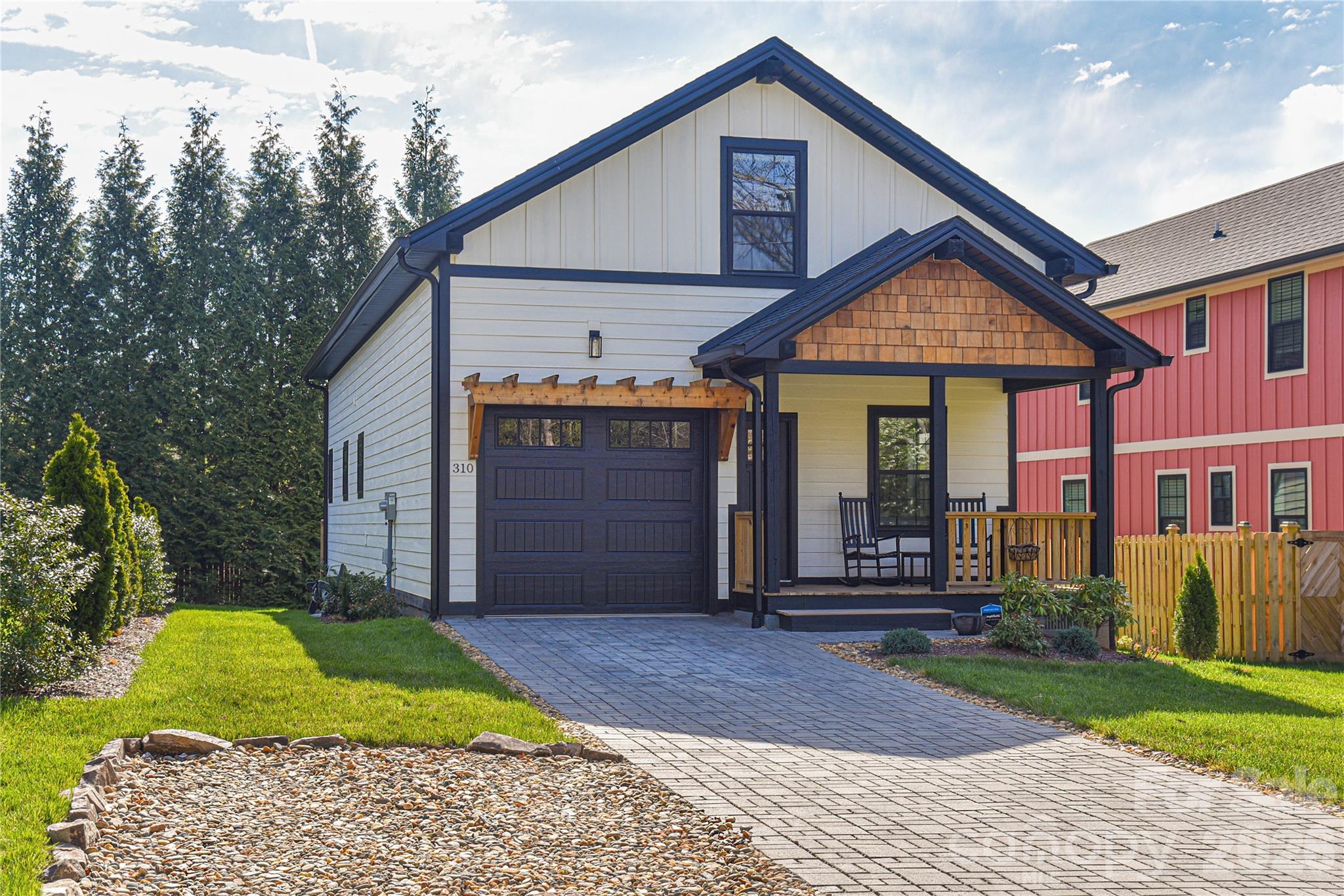 310 Portmanvilla Road Black Mountain, NC 28711 - Photo 6 of 30 a front view of a house with a yard and garage