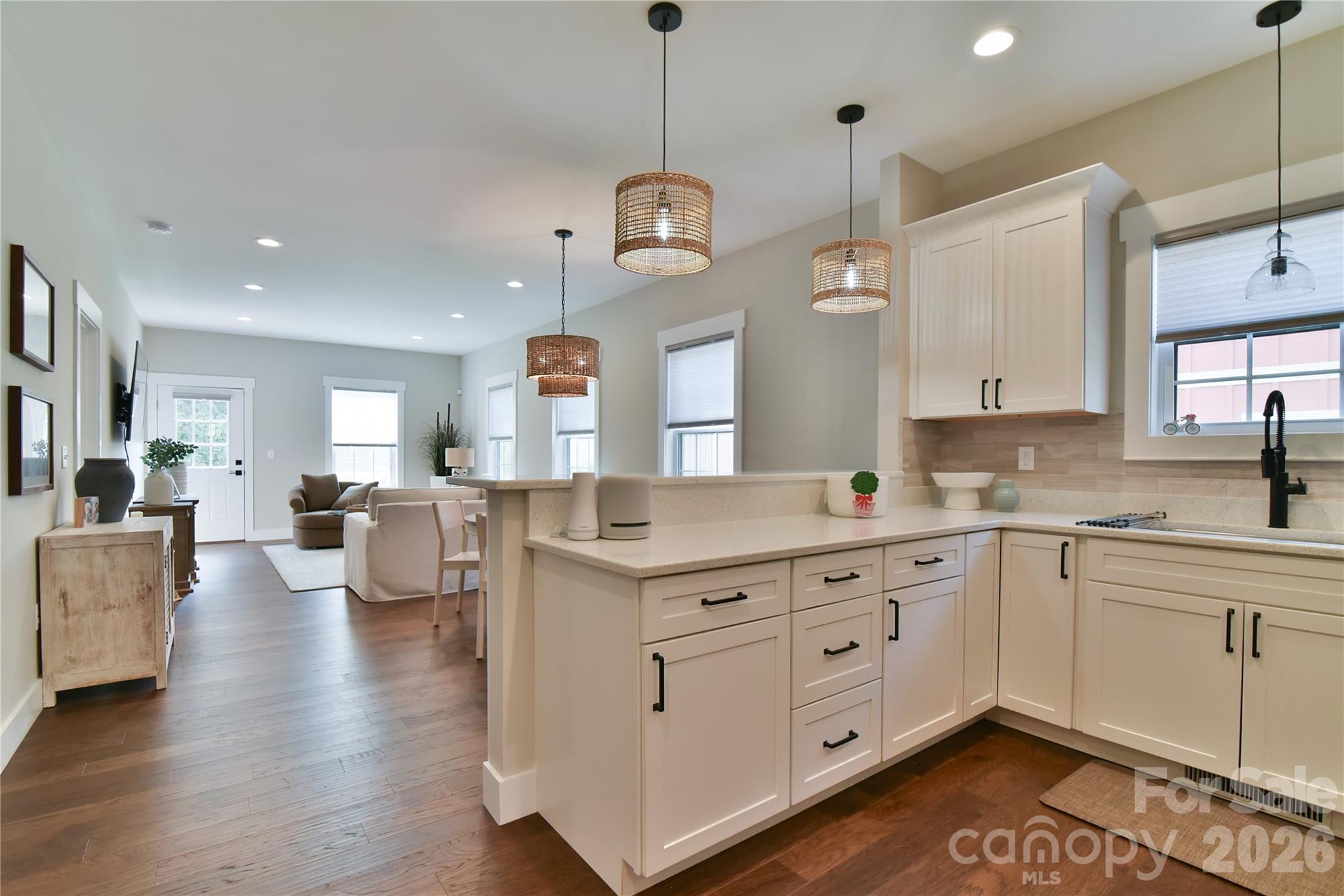 310 Portmanvilla Road Black Mountain, NC 28711 - Photo 10 of 30 a large kitchen with white cabinets and dishwasher
