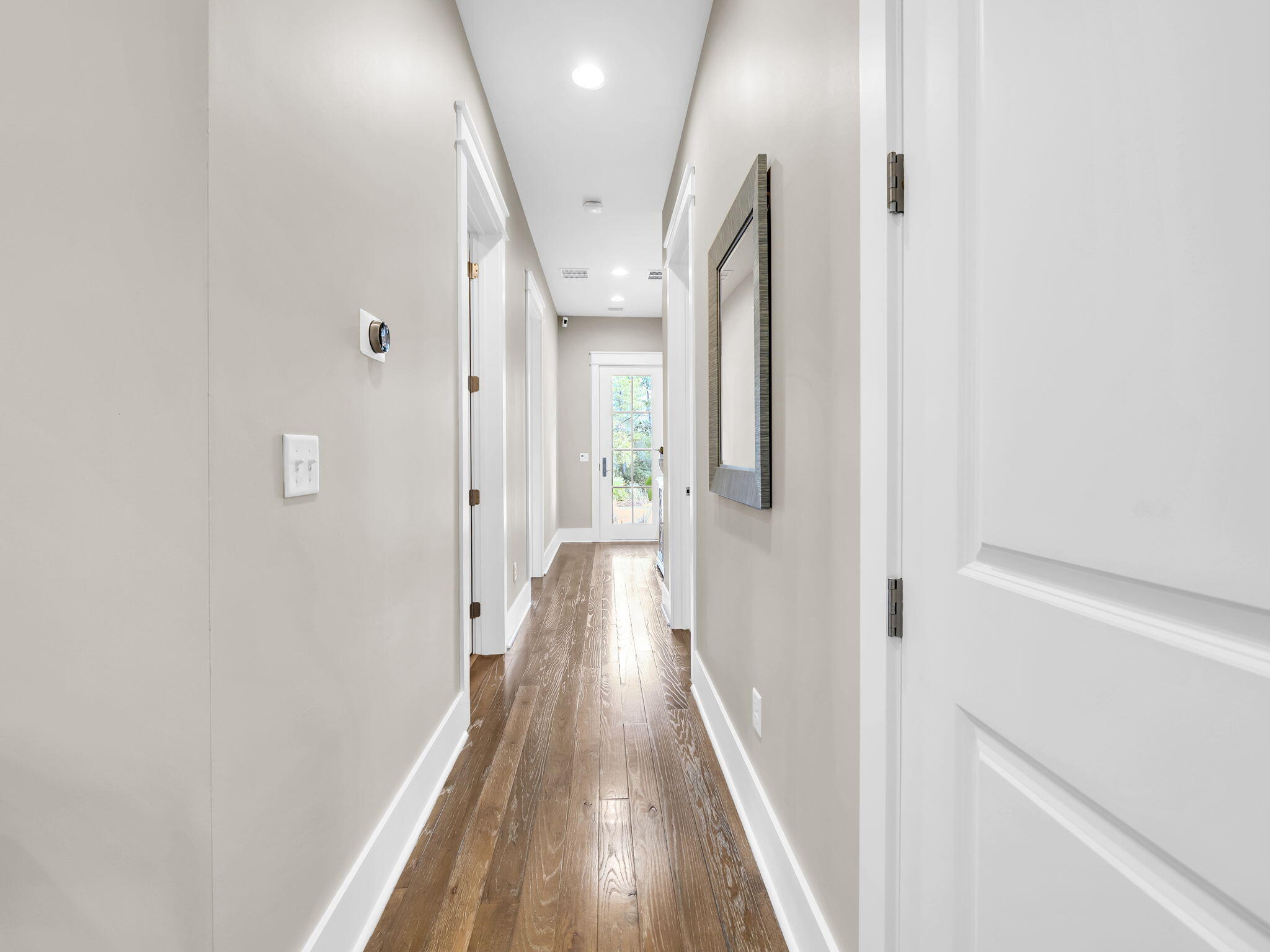 83 Cypress Walk Santa Rosa Beach, FL 32459 - Photo 22 of 77 a view of a hallway with wooden floor