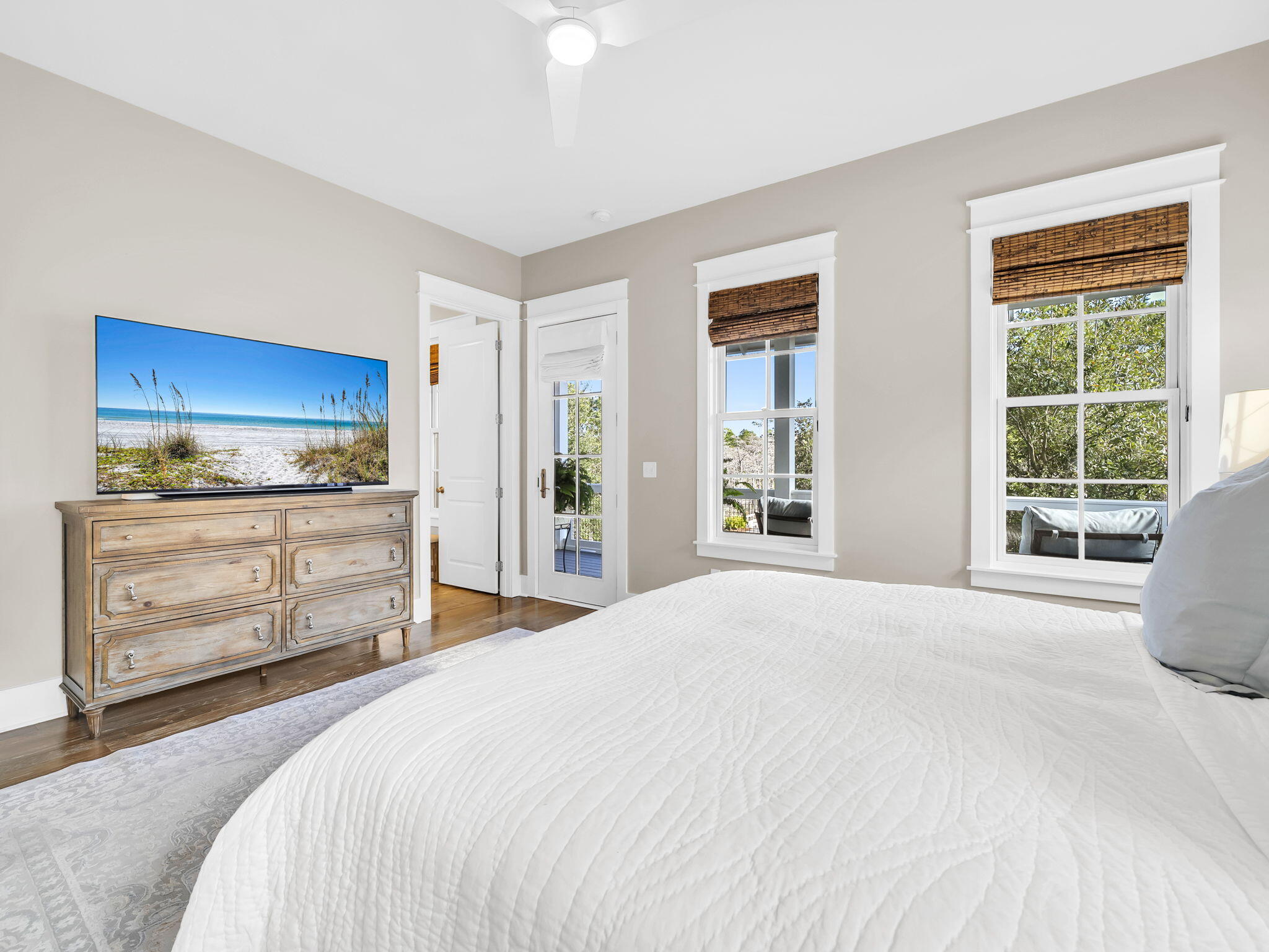 83 Cypress Walk Santa Rosa Beach, FL 32459 - Photo 39 of 77 a bedroom with a bed and wooden floor