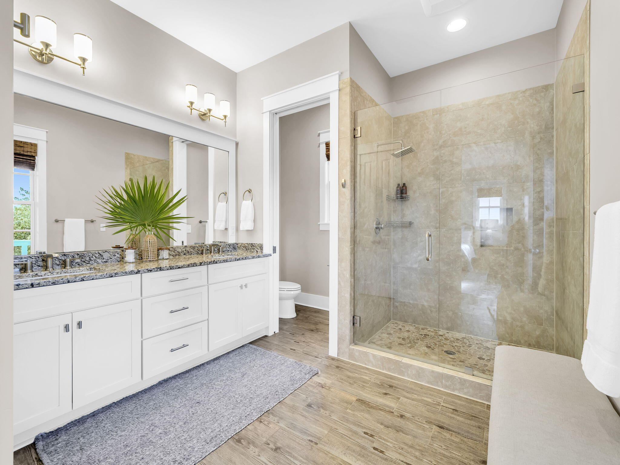 83 Cypress Walk Santa Rosa Beach, FL 32459 - Photo 40 of 77 a bathroom with a granite countertop sink a mirror a glass door a shower and a mirror