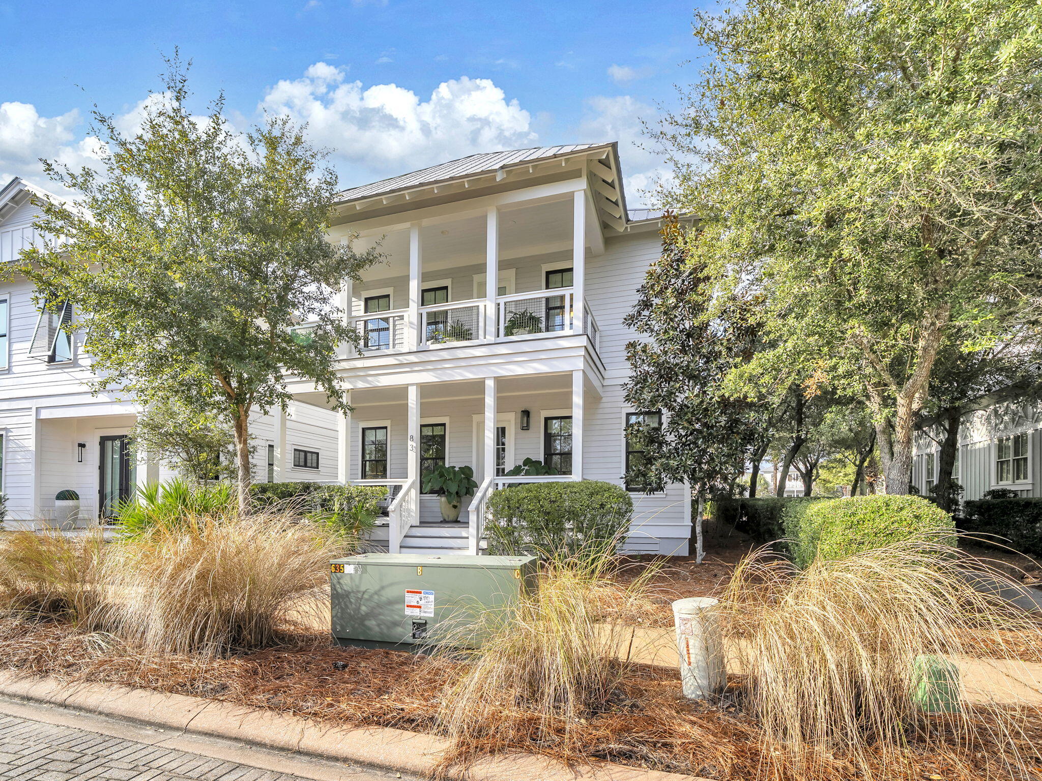 83 Cypress Walk Santa Rosa Beach, FL 32459 - Photo 5 of 77 a front view of a house with a yard