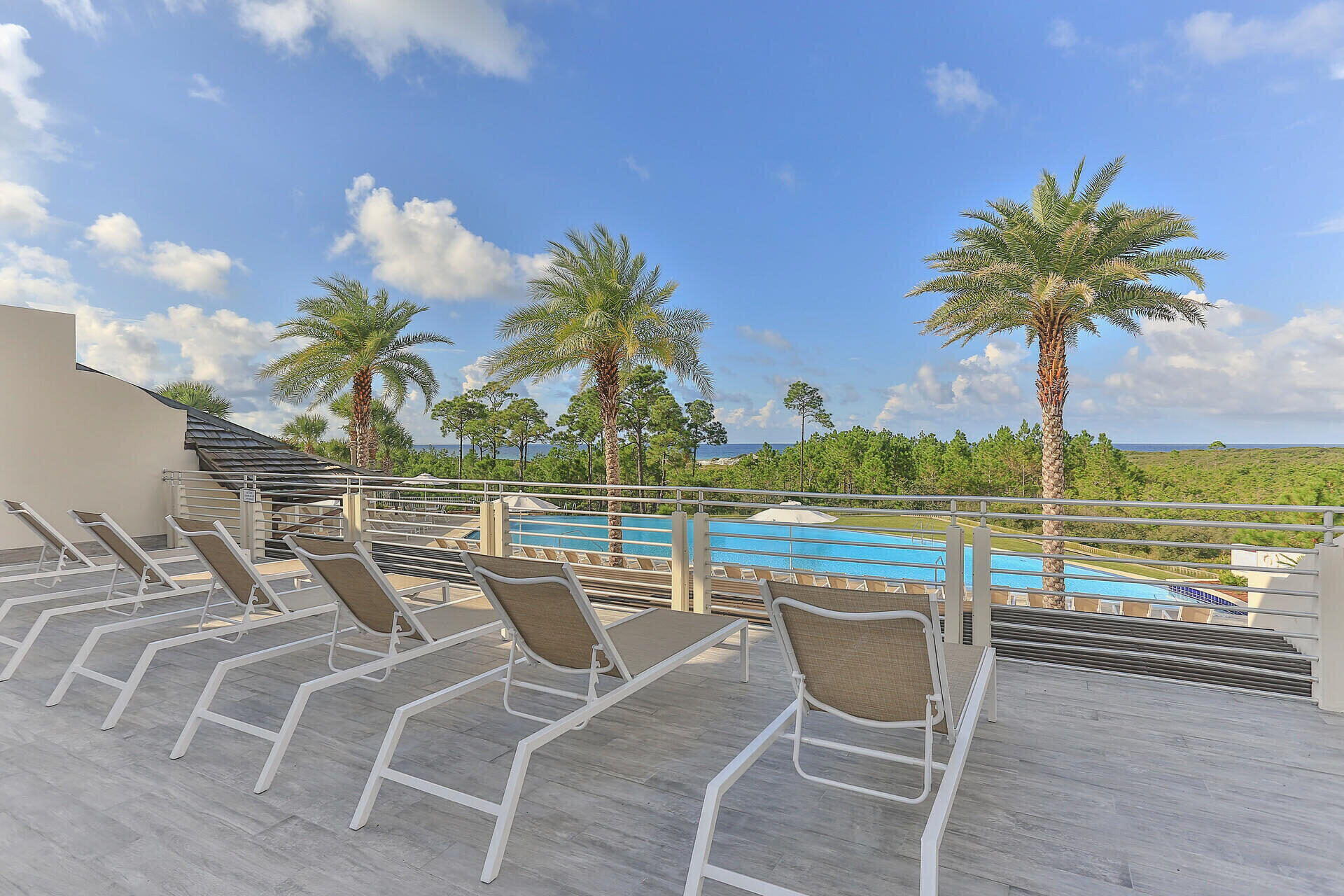 83 Cypress Walk Santa Rosa Beach, FL 32459 - Photo 72 of 77 a view of a swimming pool with a lounge chair