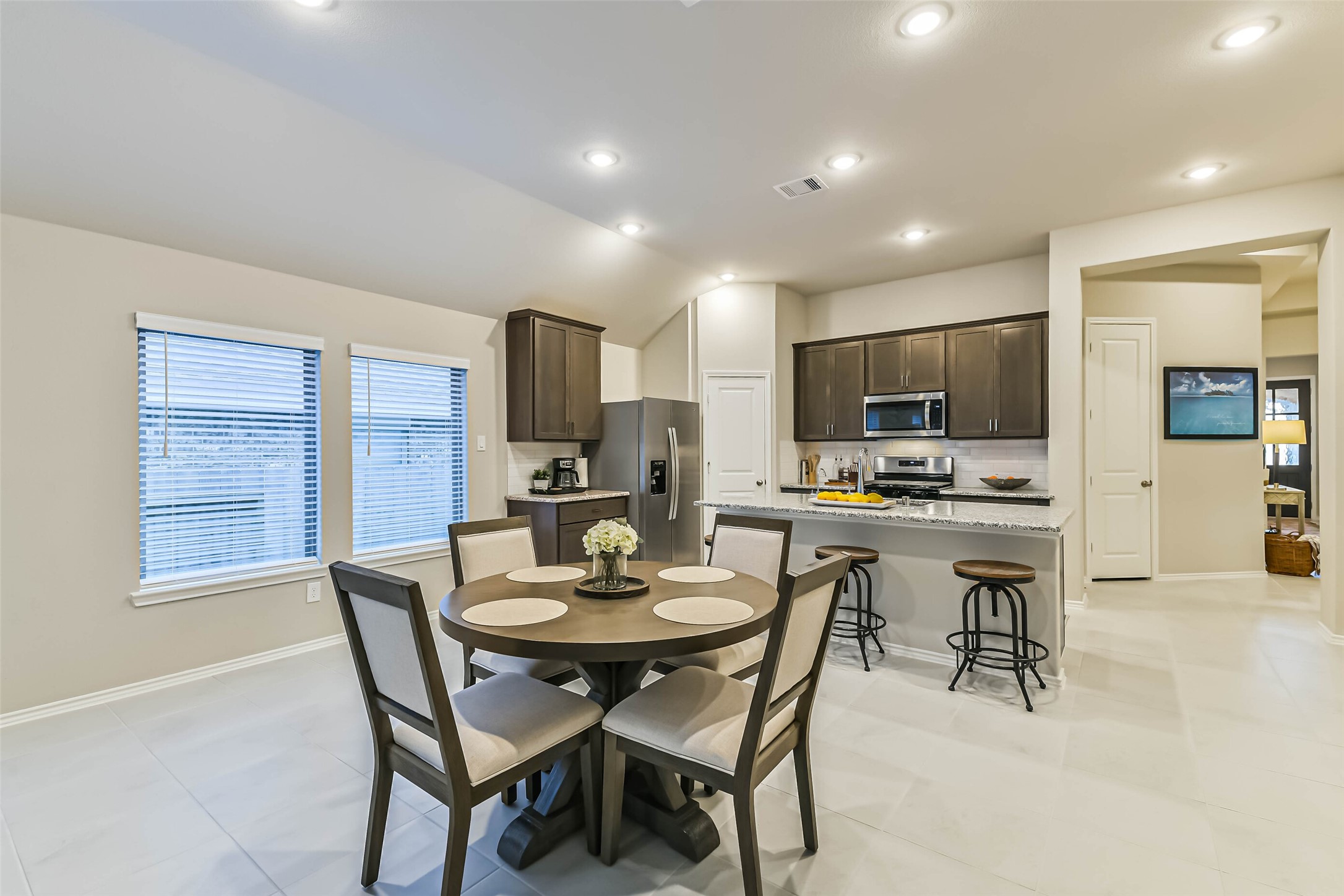 1337 Lakeside Crk Road Magnolia, TX 77354 - Photo 11 of 34 a view of a dining room with furniture