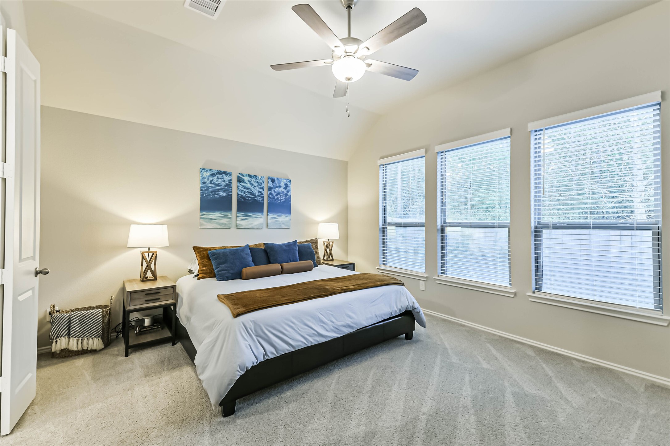 1337 Lakeside Crk Road Magnolia, TX 77354 - Photo 16 of 34 a bedroom with a bed and a large window