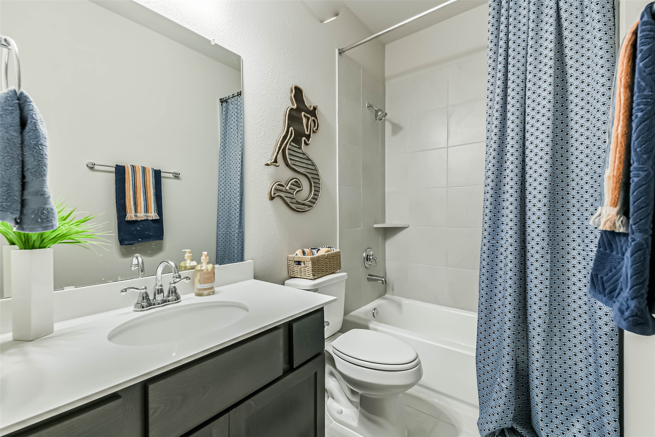 1337 Lakeside Crk Road Magnolia, TX 77354 - Photo 24 of 34 a bathroom with a sink and a mirror