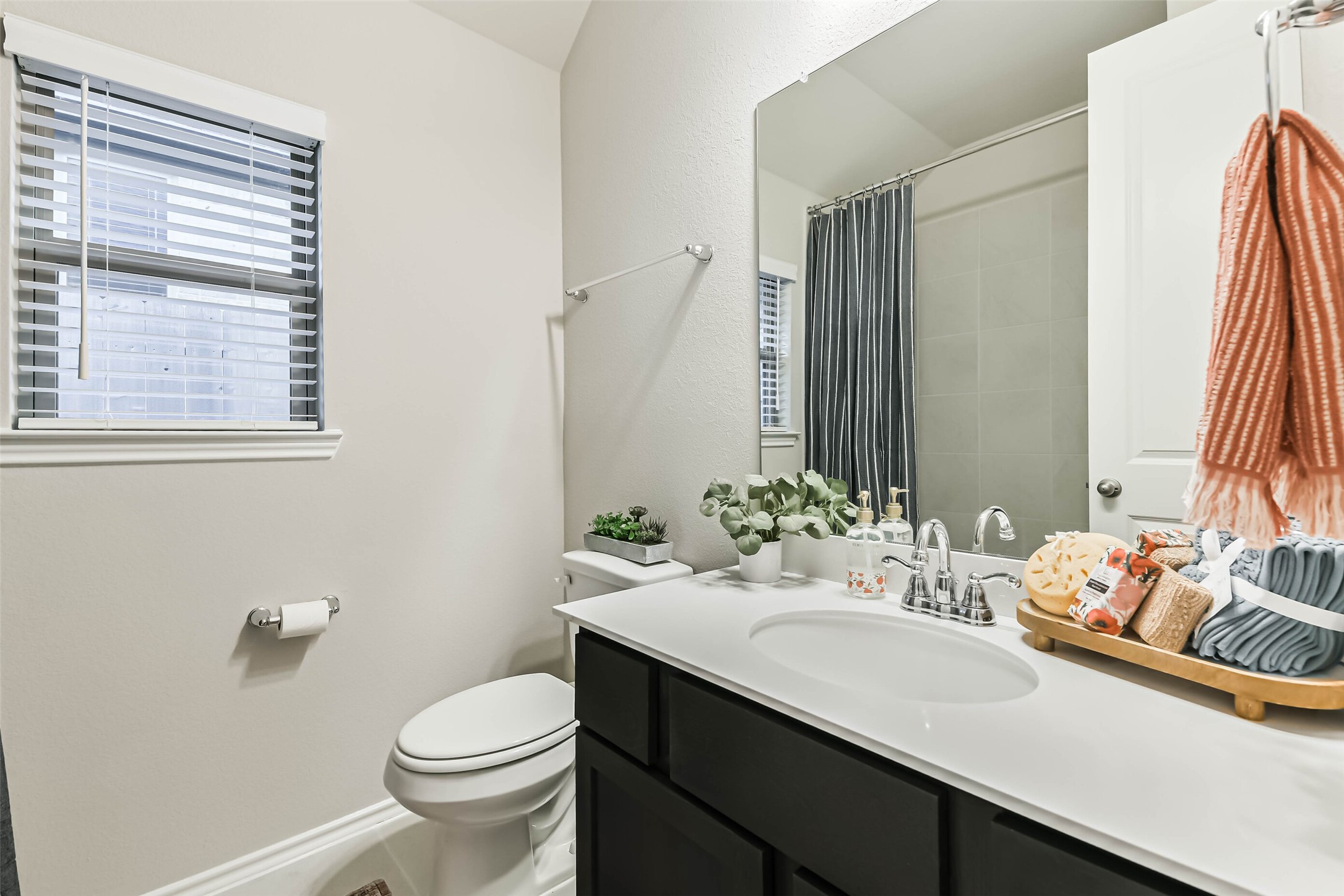 1337 Lakeside Crk Road Magnolia, TX 77354 - Photo 25 of 34 a bathroom with a sink toilet and tub