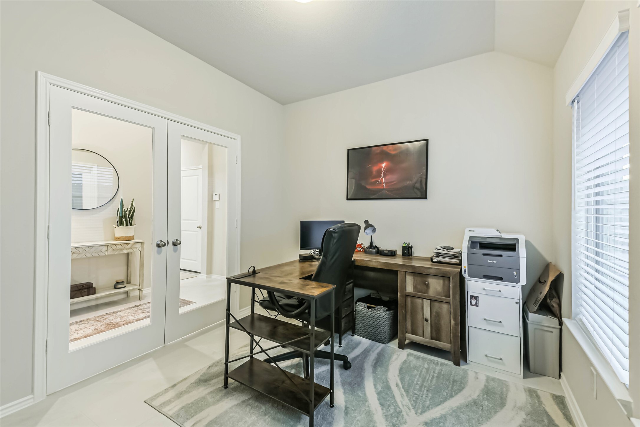 1337 Lakeside Crk Road Magnolia, TX 77354 - Photo 29 of 34 a view of a workspace with furniture and a window