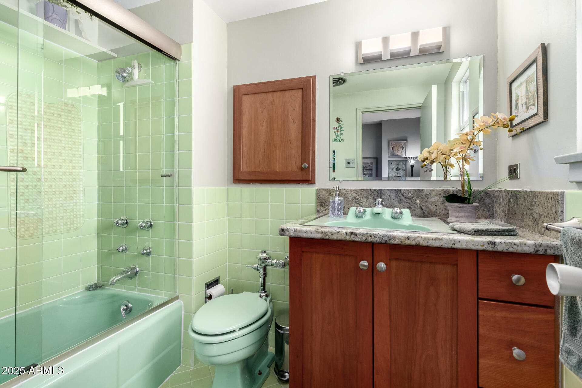 2201 North Central Avenue, Unit 5B Phoenix, AZ 85004 - Photo 17 of 35 a bathroom with a granite countertop toilet a sink and a bathtub