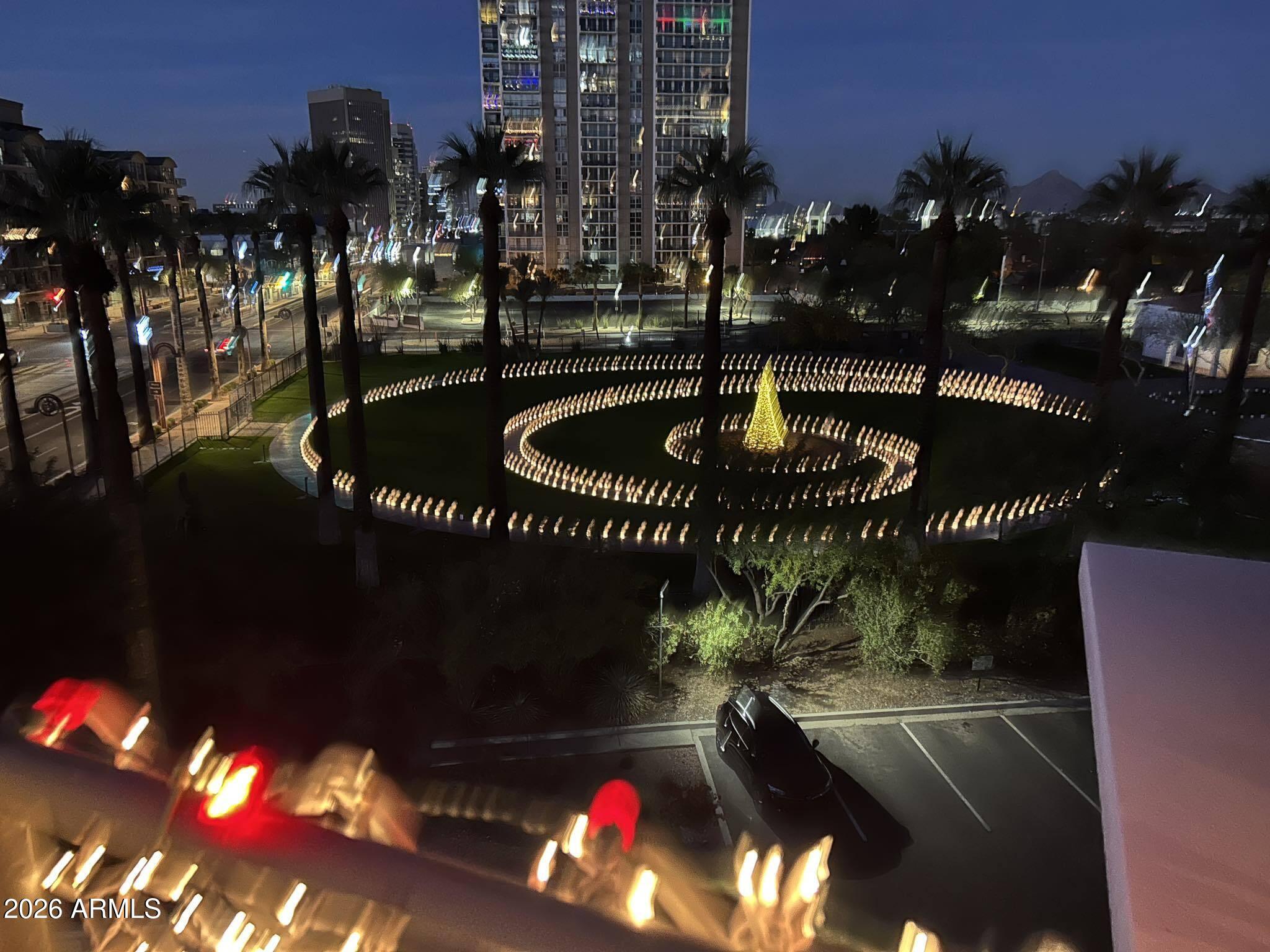 2201 North Central Avenue, Unit 5B Phoenix, AZ 85004 - Photo 2 of 35 a view of a fountain in the patio of the city