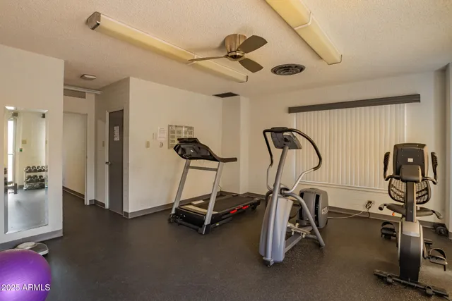 a view of a room with gym equipment