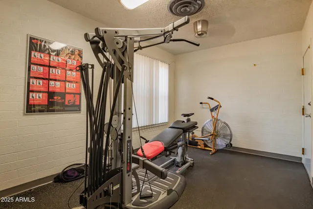 a view of a room with gym equipment