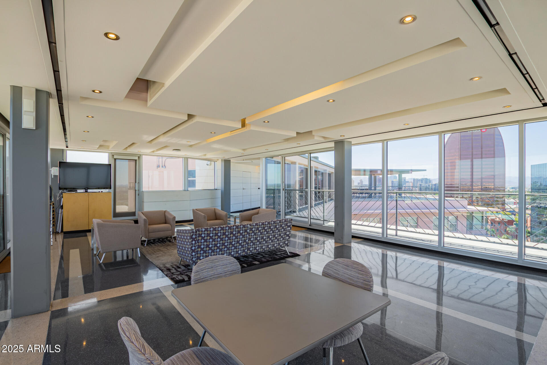 2201 North Central Avenue, Unit 5B Phoenix, AZ 85004 - Photo 27 of 35 a living room with furniture and a large window