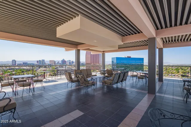 an outdoor space with patio lots of furniture