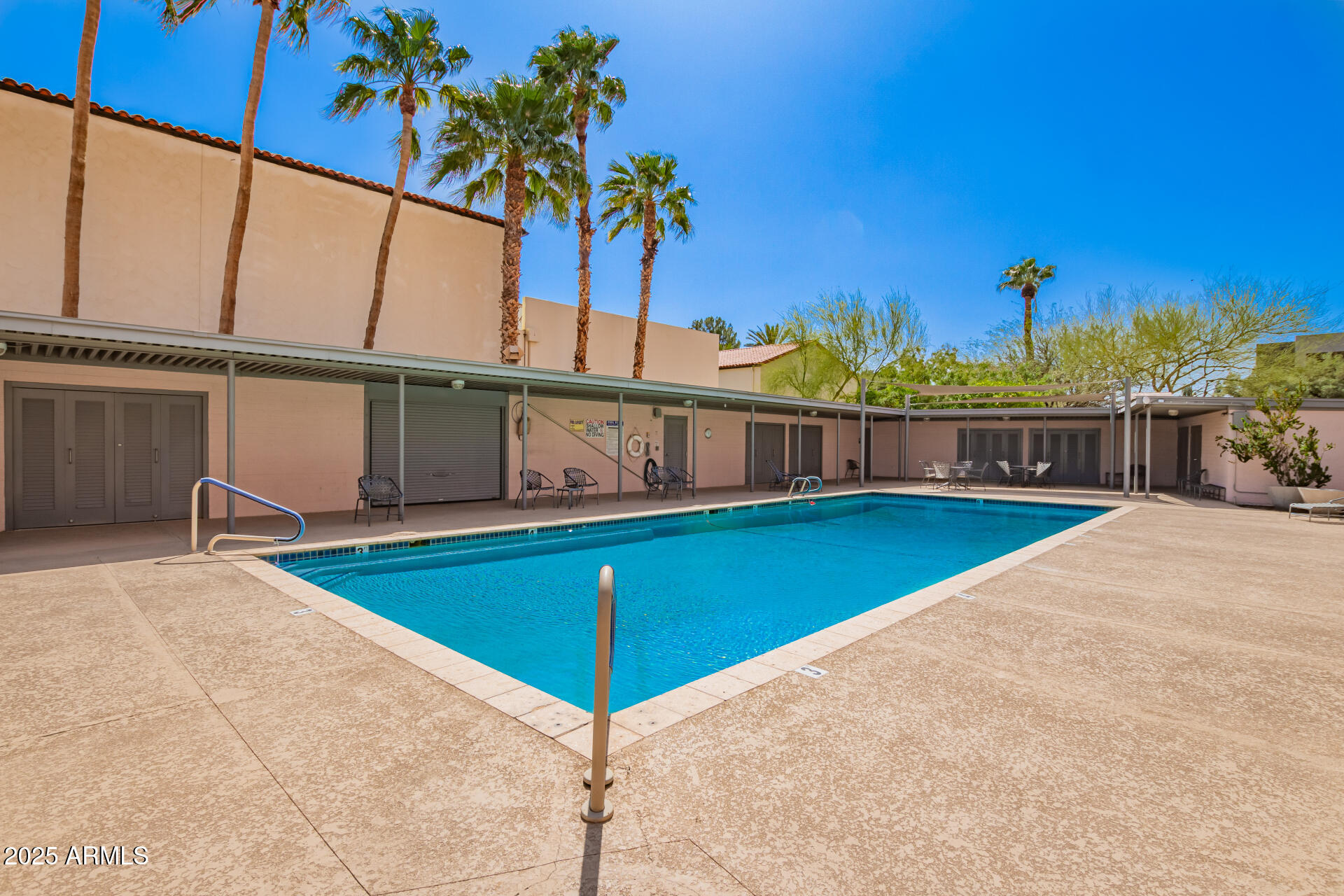 2201 North Central Avenue, Unit 5B Phoenix, AZ 85004 - Photo 33 of 35 a view of a swimming pool with a chair