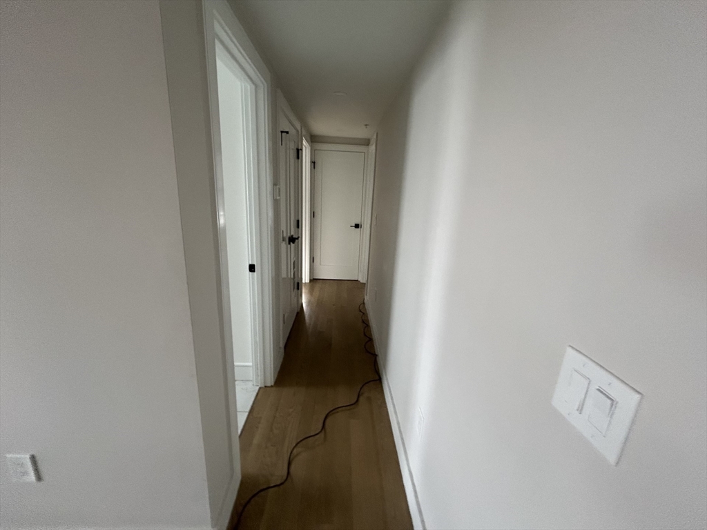 13 Greylock Road, Unit 3 Boston, MA 02134 - Photo 3 of 10 a view of a hallway