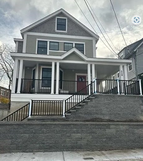 13 Greylock Road, Unit 3 Boston, MA 02134 - Photo 10 of 10 a front view of a house with a porch