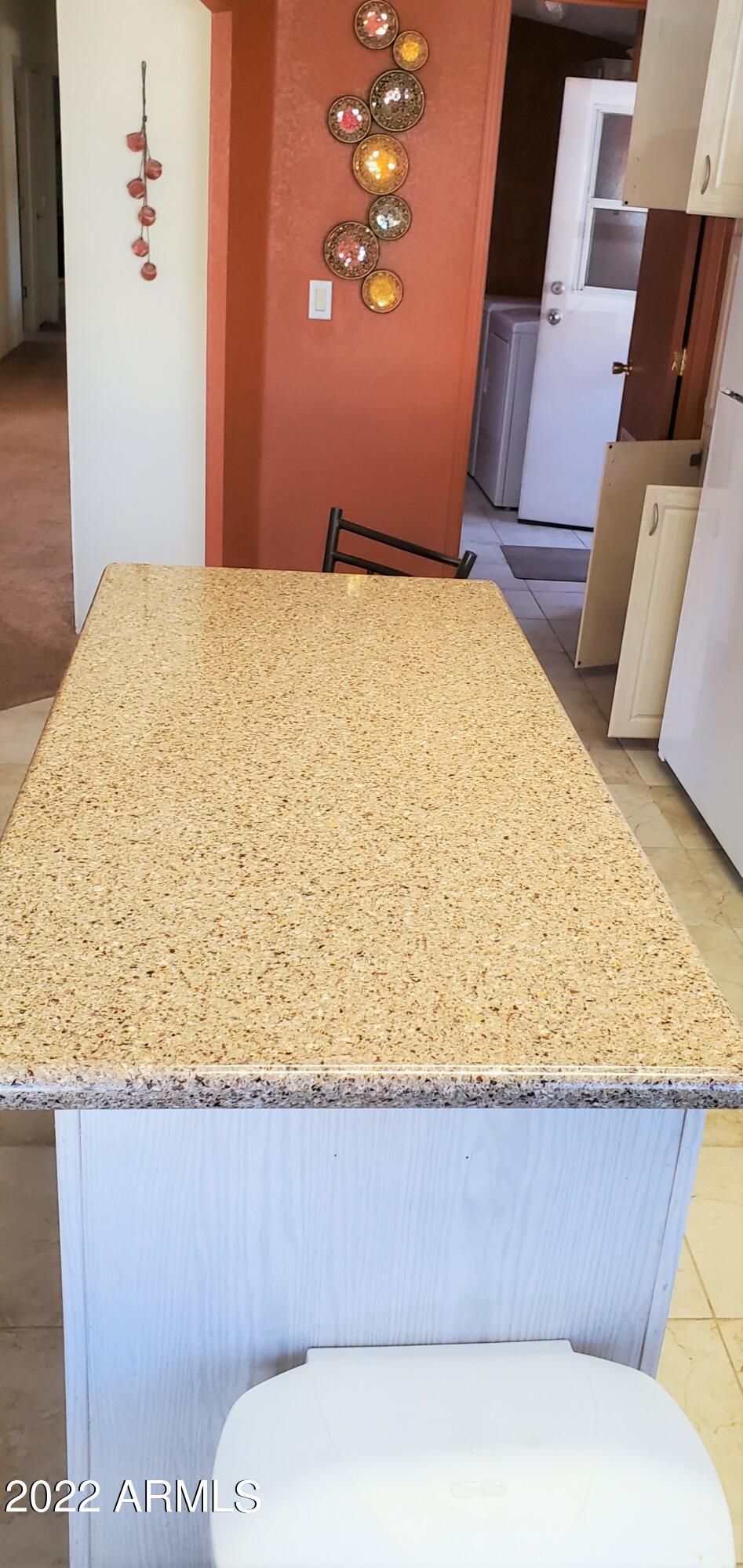 11201 North El Mirage Road, Unit A22 El Mirage, AZ 85335 - Photo 16 of 41 Kitchen Island