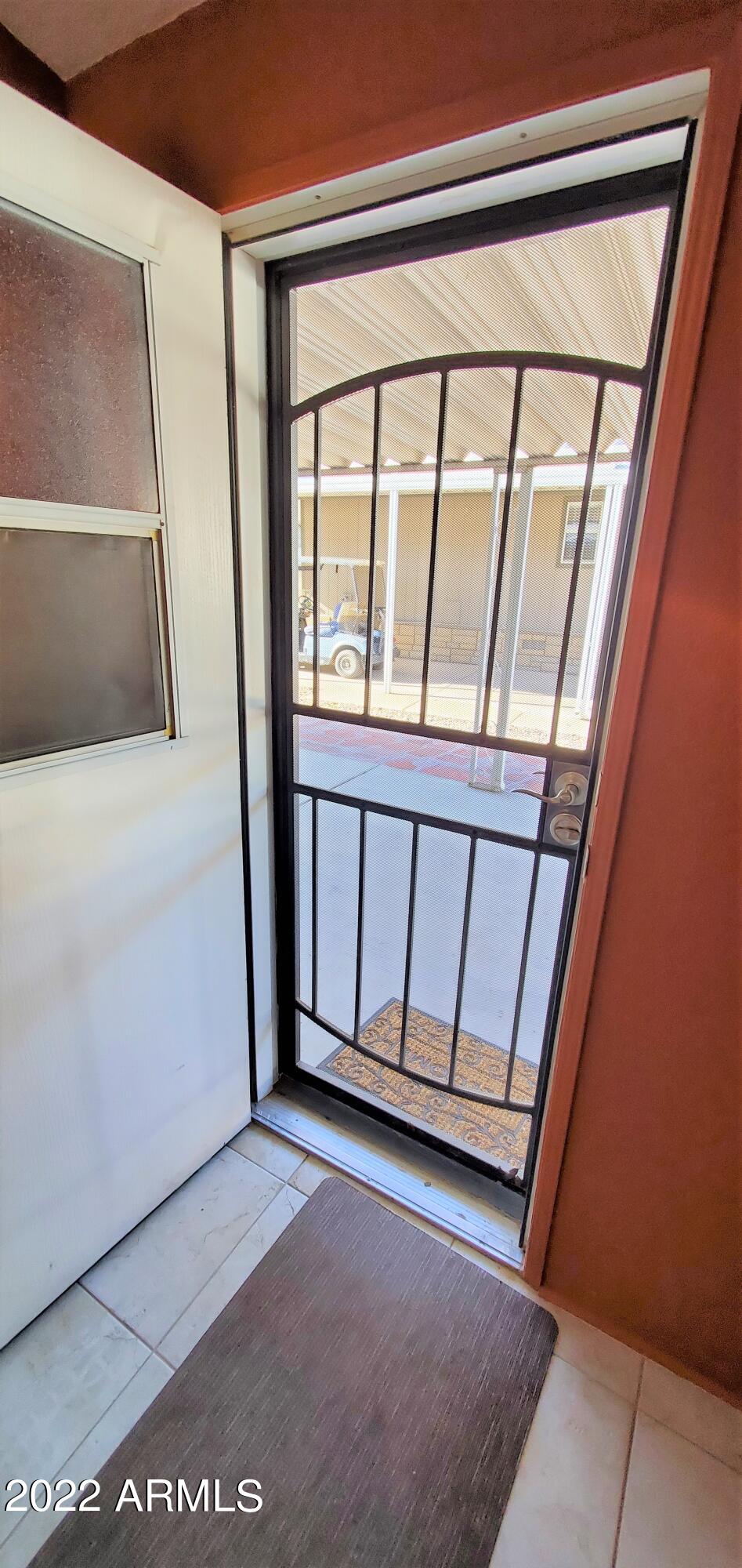 11201 North El Mirage Road, Unit A22 El Mirage, AZ 85335 - Photo 27 of 41 Back Door w Security Screen