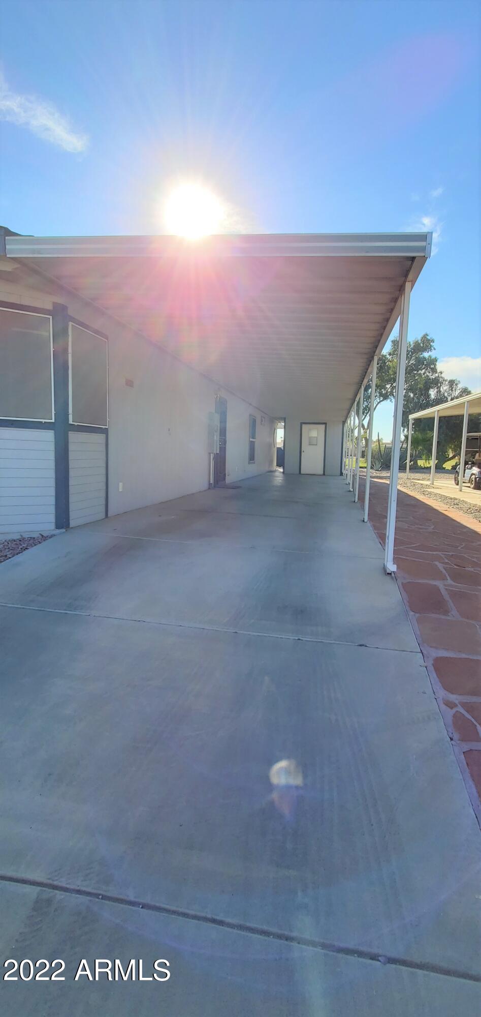 11201 North El Mirage Road, Unit A22 El Mirage, AZ 85335 - Photo 29 of 41 Covered Carport Parking