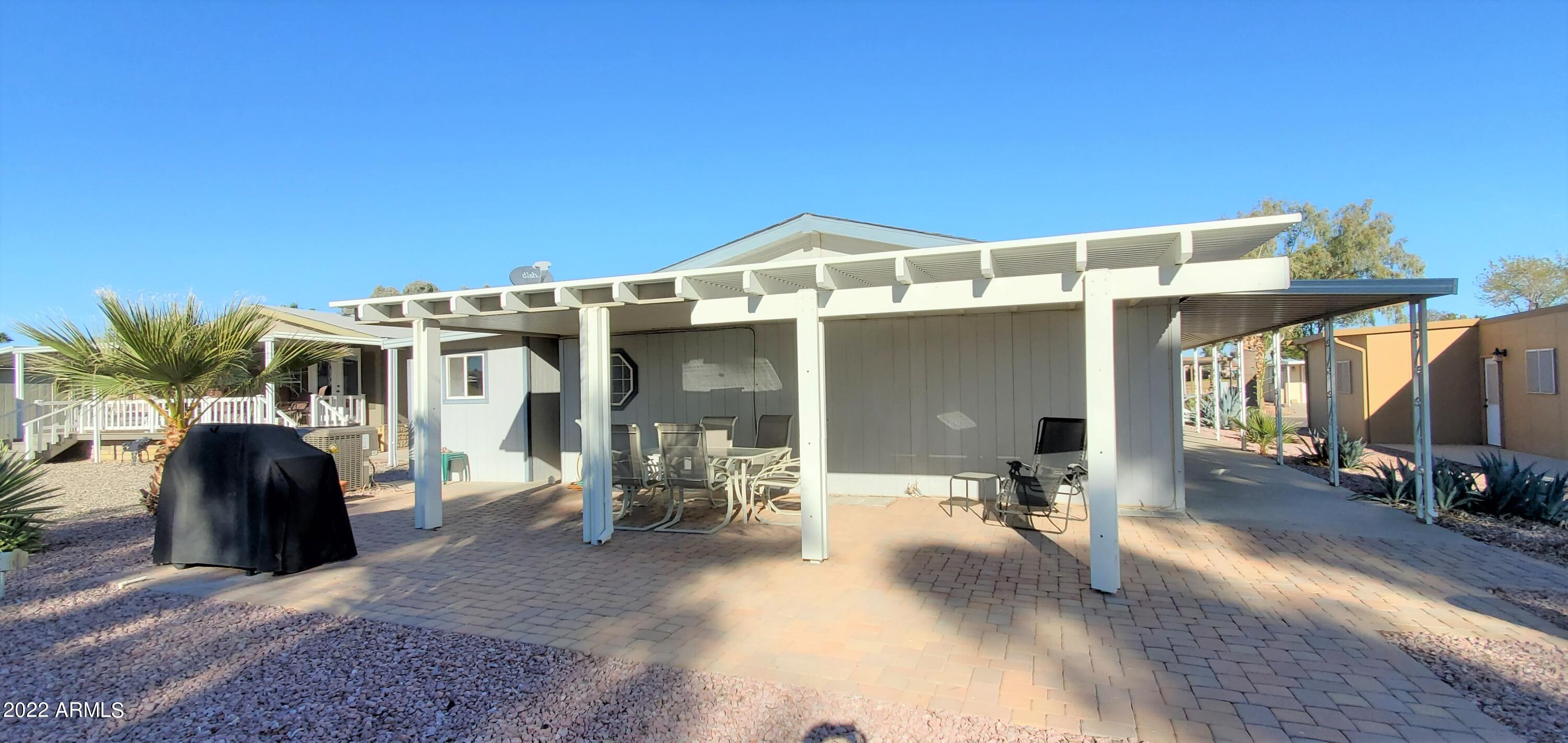 11201 North El Mirage Road, Unit A22 El Mirage, AZ 85335 - Photo 30 of 41 Covered Patio & BBQ