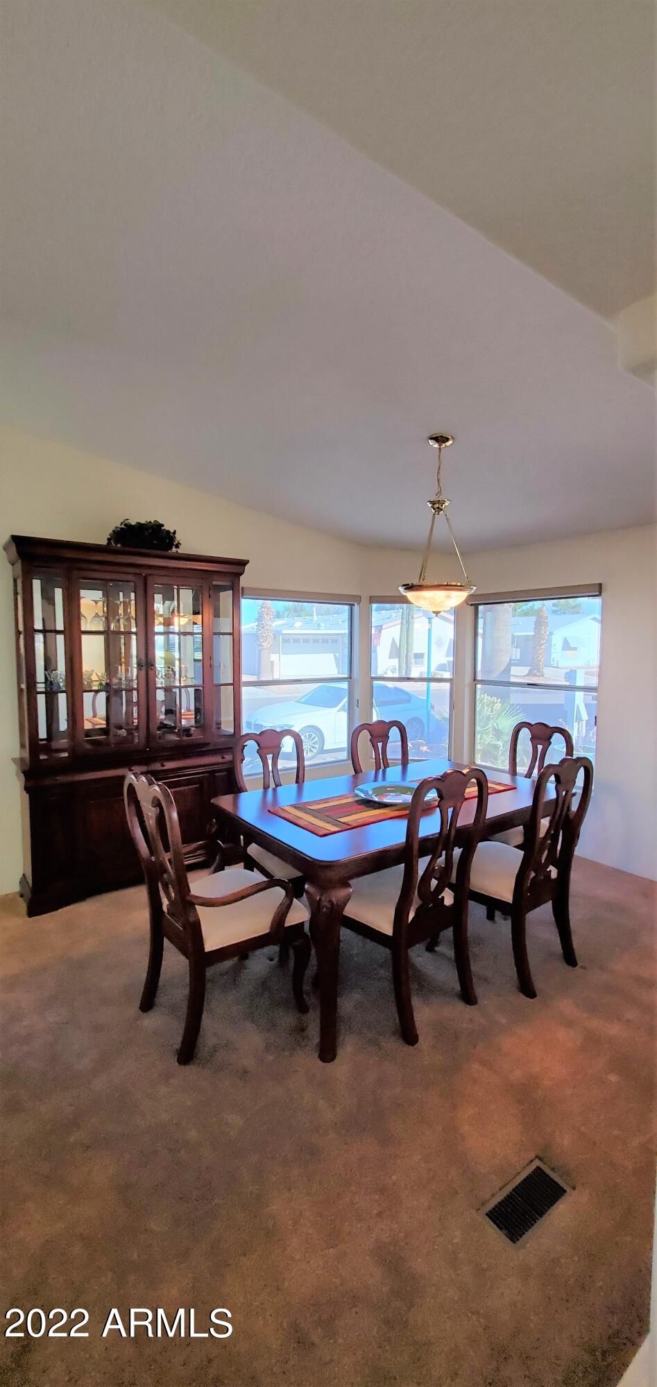11201 North El Mirage Road, Unit A22 El Mirage, AZ 85335 - Photo 4 of 41 Lg Furnished Dining Rm