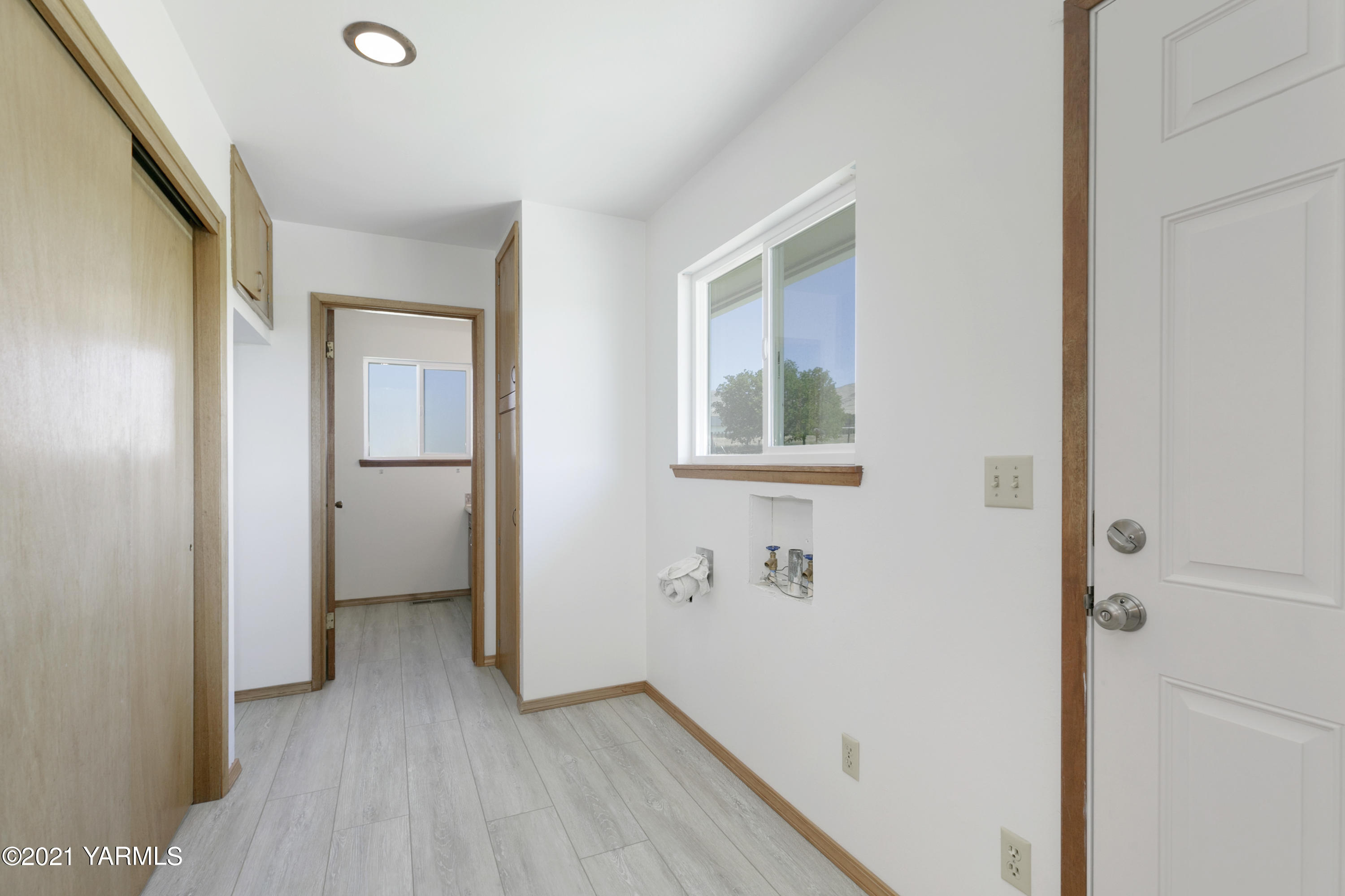 413 Wendt Road Yakima, WA 98901 - Photo 17 of 24 a view of a room with wooden floor and a bathroom