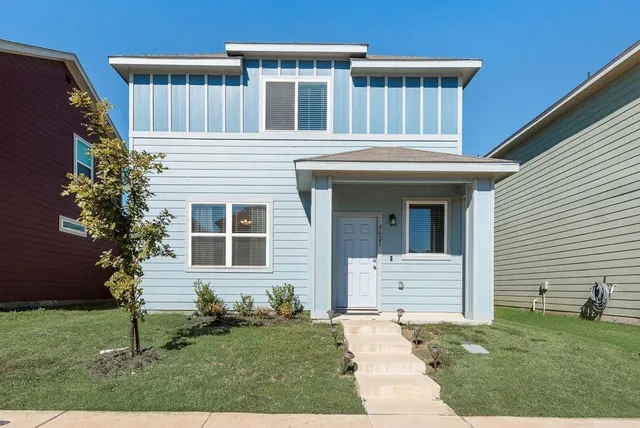 a house view with a garden space