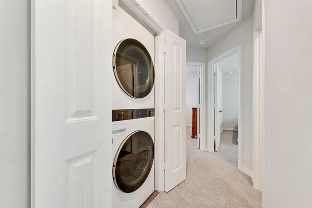 a view of livingroom with washer and dryer