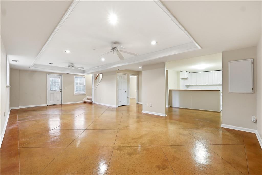 5145 Harbour Ridge Drive Alpharetta, GA 30005 - Photo 20 of 25 a view of an empty room with a kitchen