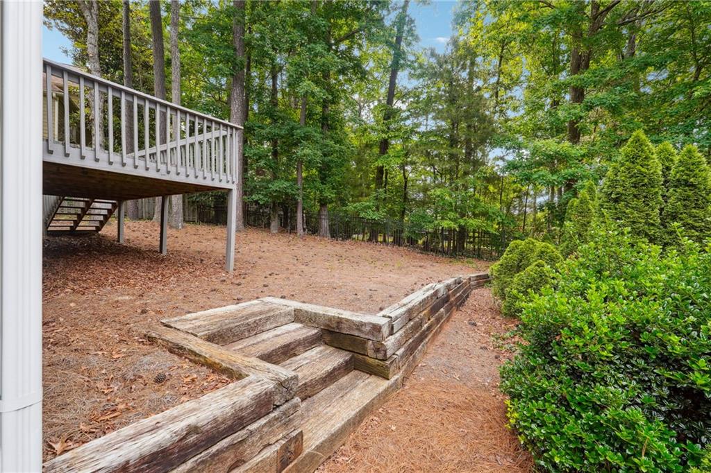 5145 Harbour Ridge Drive Alpharetta, GA 30005 - Photo 27 of 27 a view of a backyard with sitting area