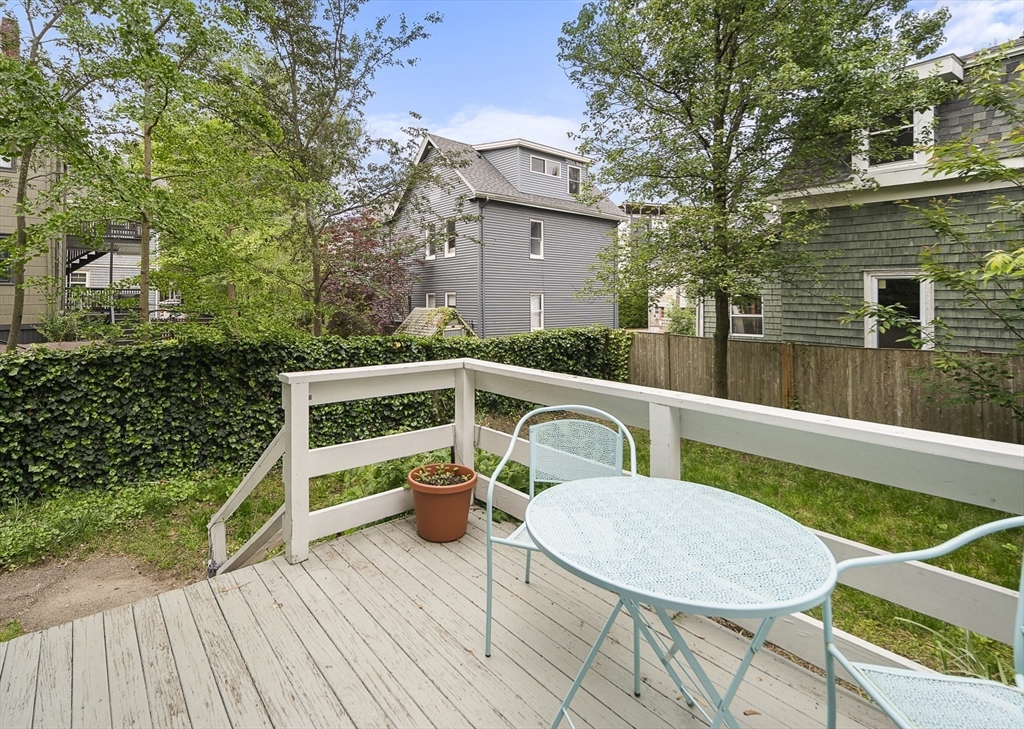 28 Summer Street, Unit 1 Somerville, MA 02143 - Photo 11 of 14 a house view with a seating space