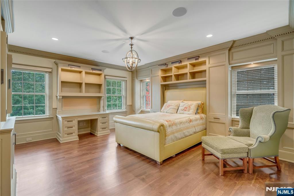 480 Knollwood Road Ridgewood, NJ 07450 - Photo 19 of 50 a white bed sitting in a room next to a window