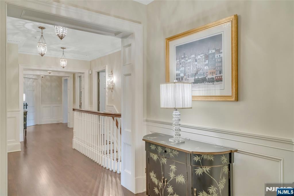 480 Knollwood Road Ridgewood, NJ 07450 - Photo 20 of 50 a view of a hallway with wooden floor and front door