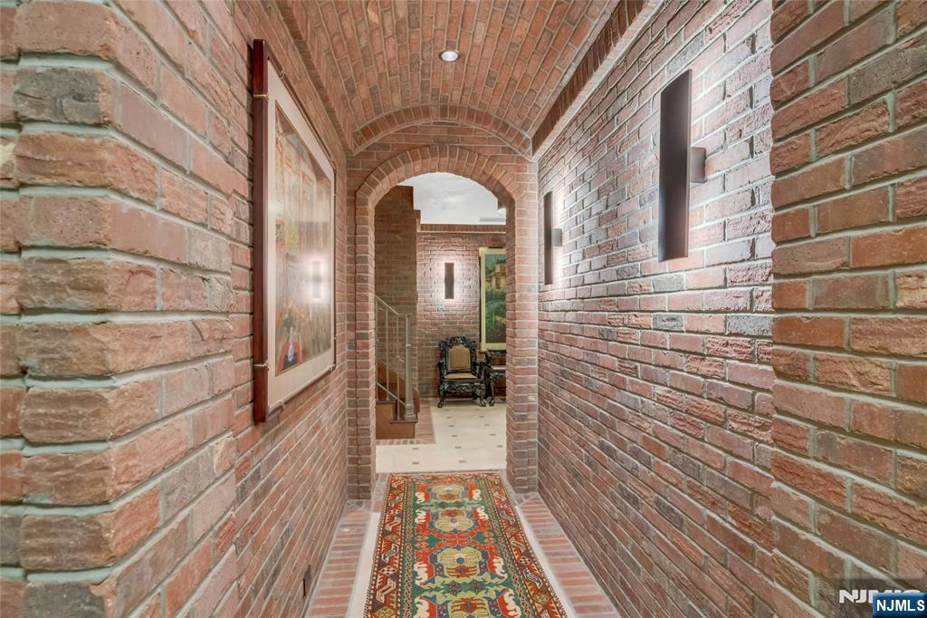 480 Knollwood Road Ridgewood, NJ 07450 - Photo 30 of 50 a view of a house with a door and wooden floor