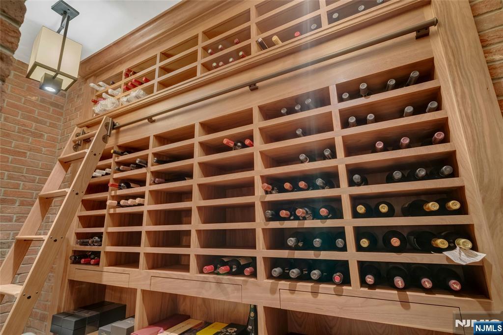 480 Knollwood Road Ridgewood, NJ 07450 - Photo 33 of 50 a view of a living room with clothes and shoes