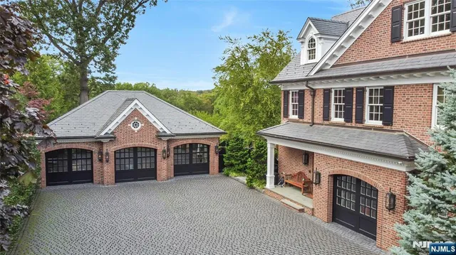 a front view of a house with a garage