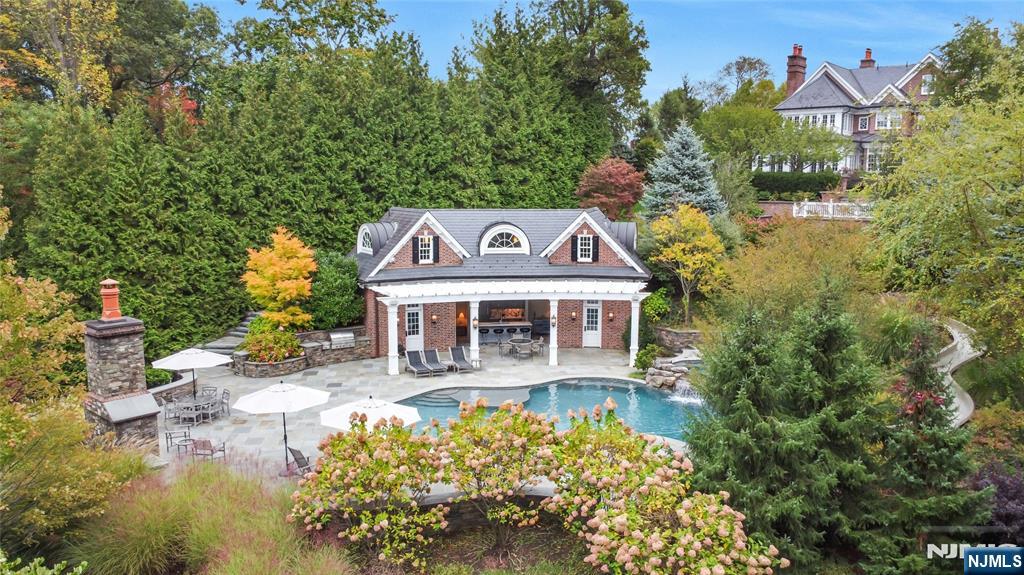 480 Knollwood Road Ridgewood, NJ 07450 - Photo 50 of 50 an aerial view of a house with yard swimming pool and outdoor seating