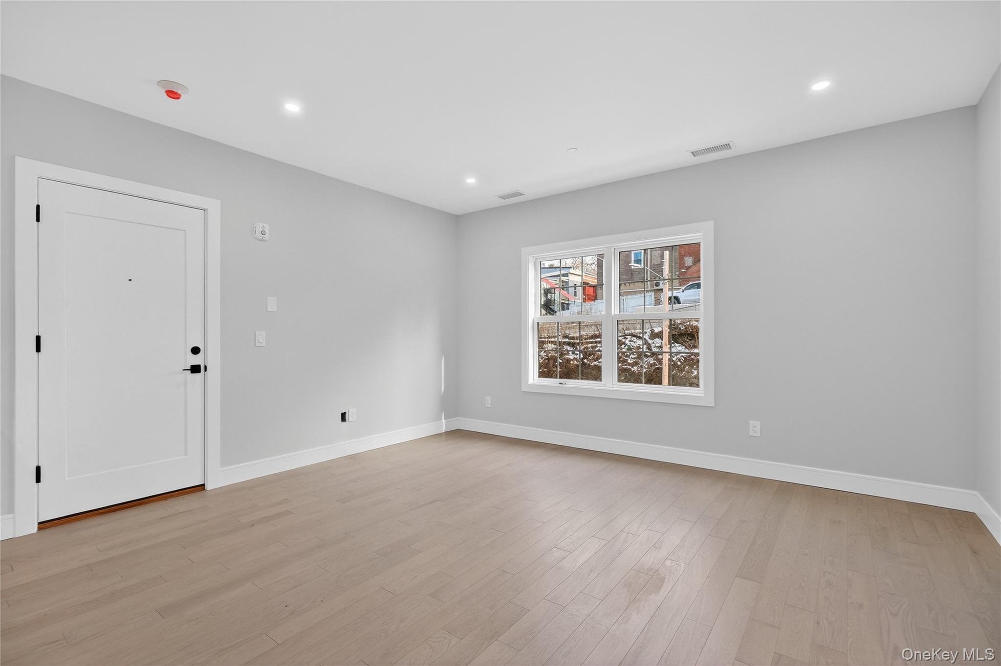 10 Market Street, Unit G Wappingers Falls, NY 12590 - Photo 6 of 20 a view of an empty room with a window