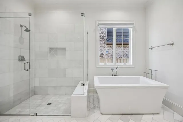 a white bath tub sitting next to a window