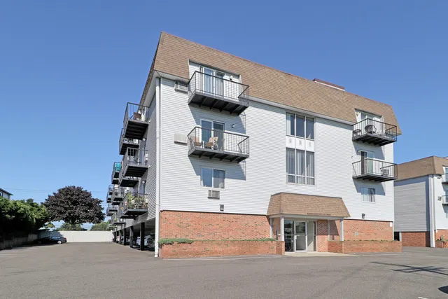 front view of a house with a street