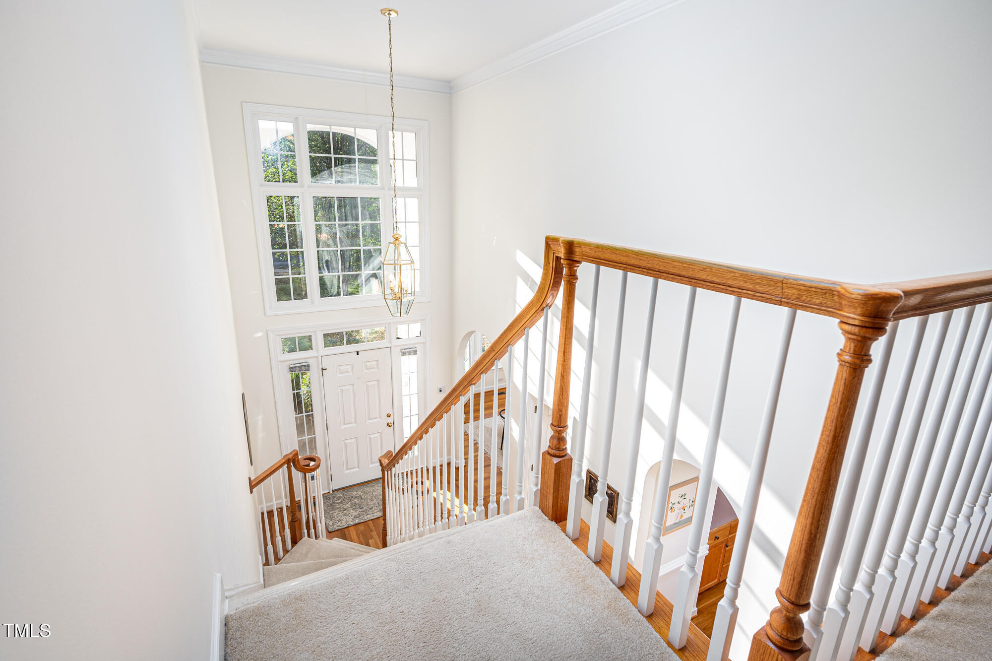 506 Manor Ridge Road Carrboro, NC 27510 - Photo 17 of 30 a view of staircase with white walls and a window
