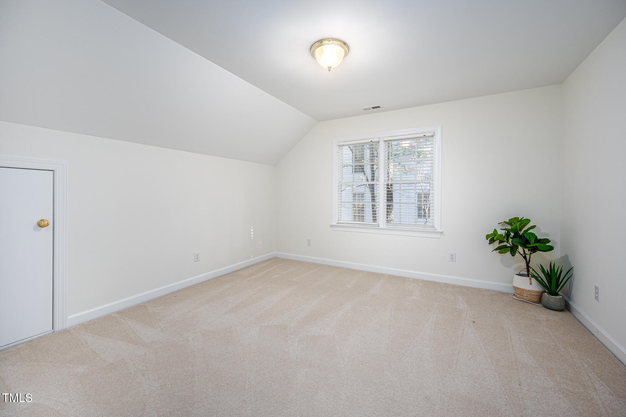 506 Manor Ridge Road Carrboro, NC 27510 - Photo 22 of 30 an empty room with windows and flowers
