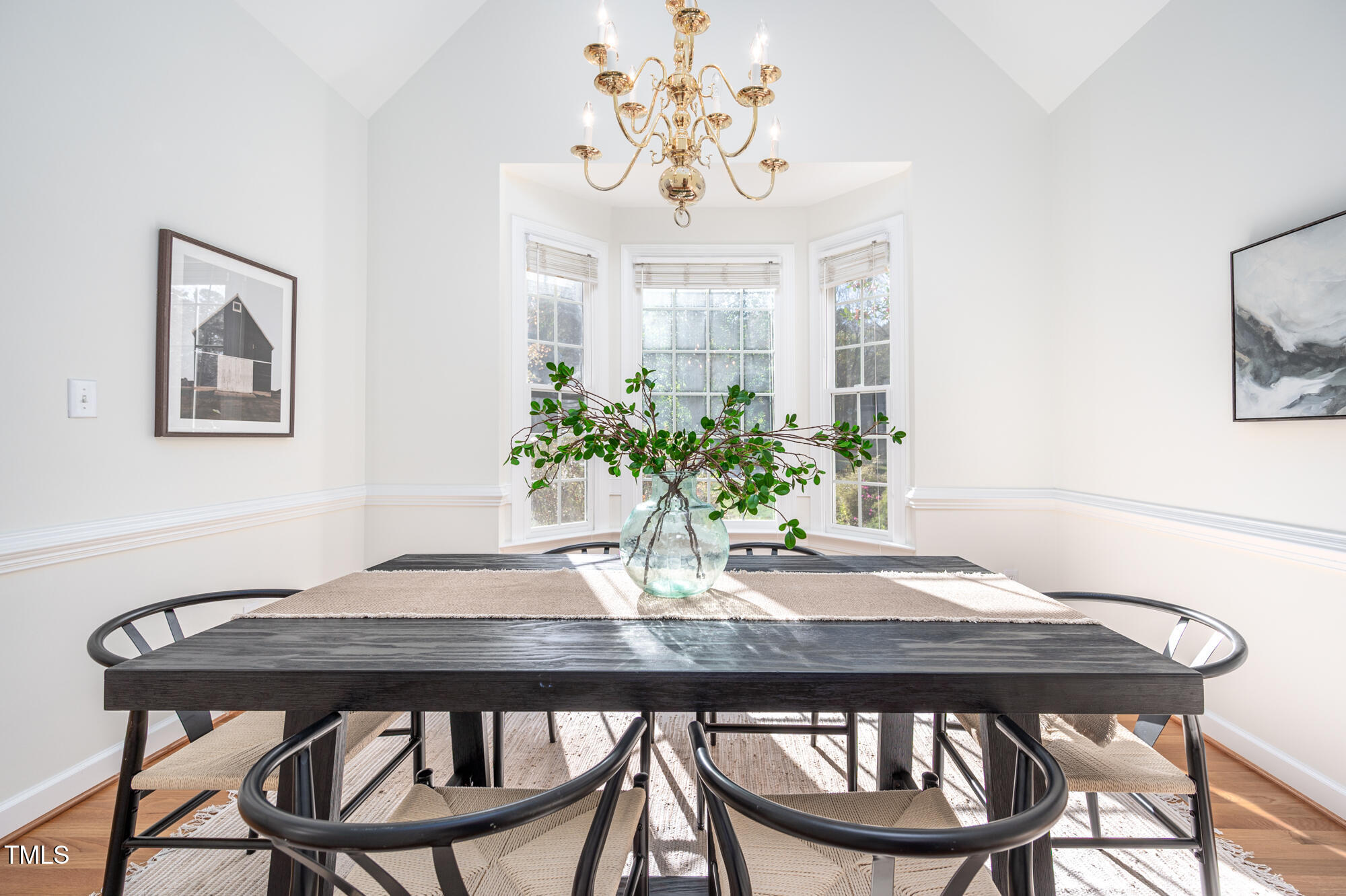 506 Manor Ridge Road Carrboro, NC 27510 - Photo 4 of 30 a view of a dining room with furniture and chandelier