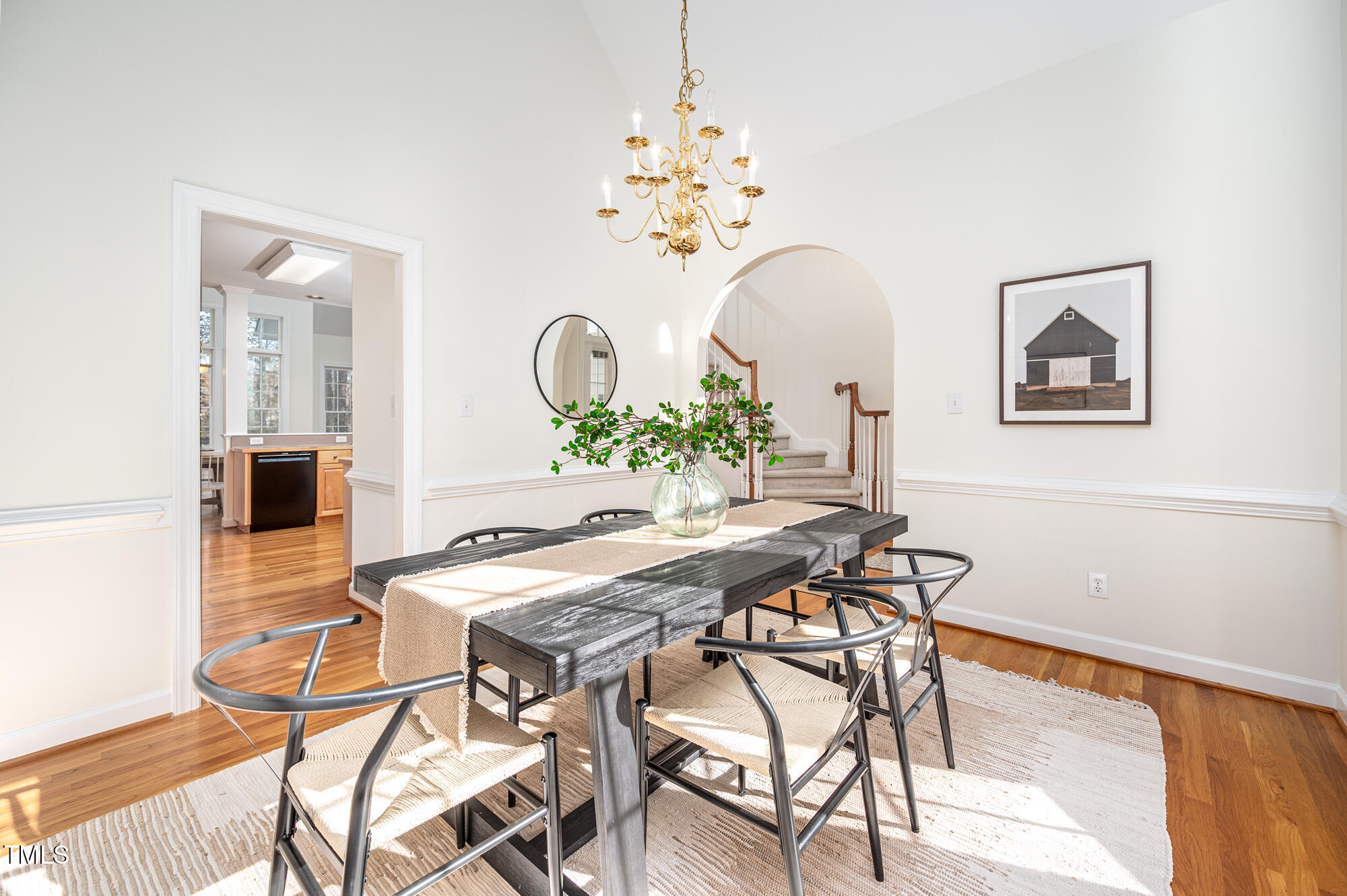 506 Manor Ridge Road Carrboro, NC 27510 - Photo 5 of 30 a view of a dining room with furniture and chandelier