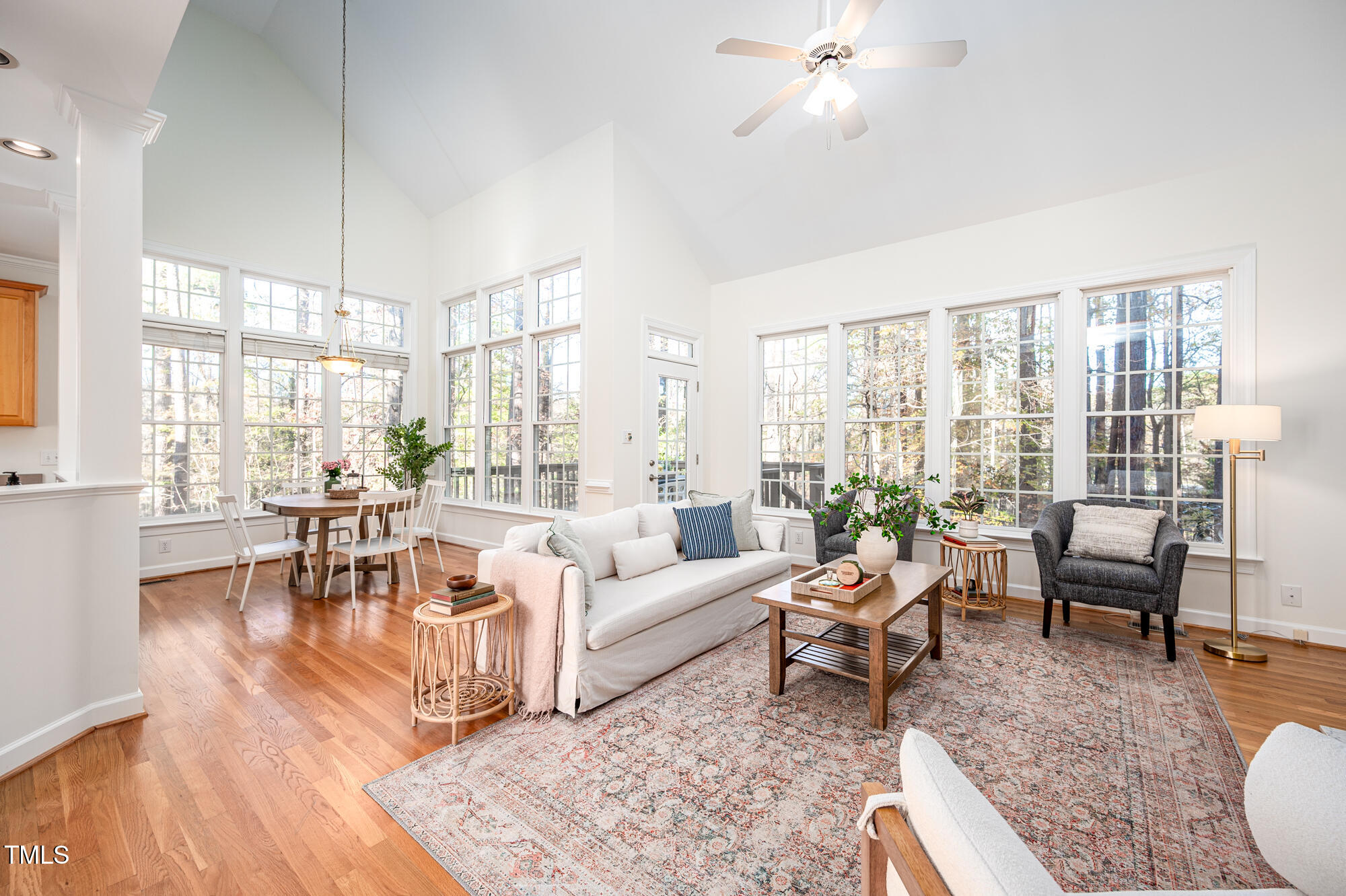 506 Manor Ridge Road Carrboro, NC 27510 - Photo 6 of 30 a living room with furniture large window and wooden floor