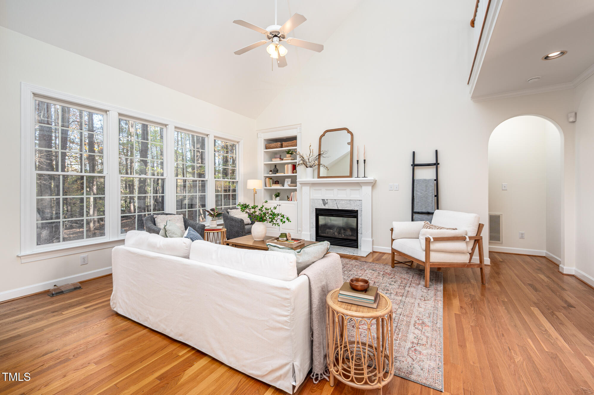 506 Manor Ridge Road Carrboro, NC 27510 - Photo 8 of 30 a living room with furniture a fireplace and a large window
