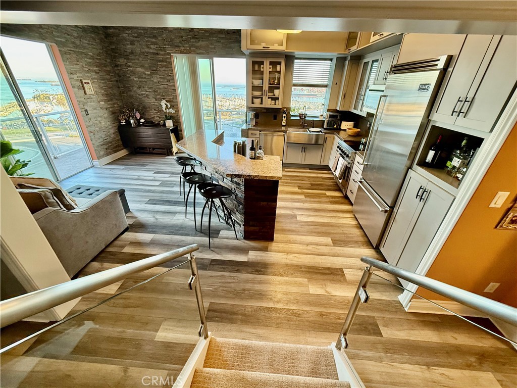 488 East Ocean Boulevard, Unit P2 Long Beach, CA 90802 - Photo 7 of 15 a living room with furniture and a fireplace